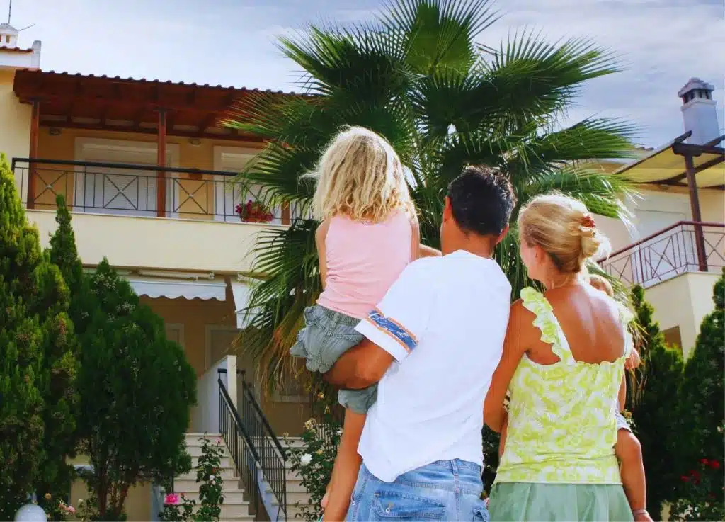 Family looking at a new home, representing The Lenoir Team’s expert home buying support services.