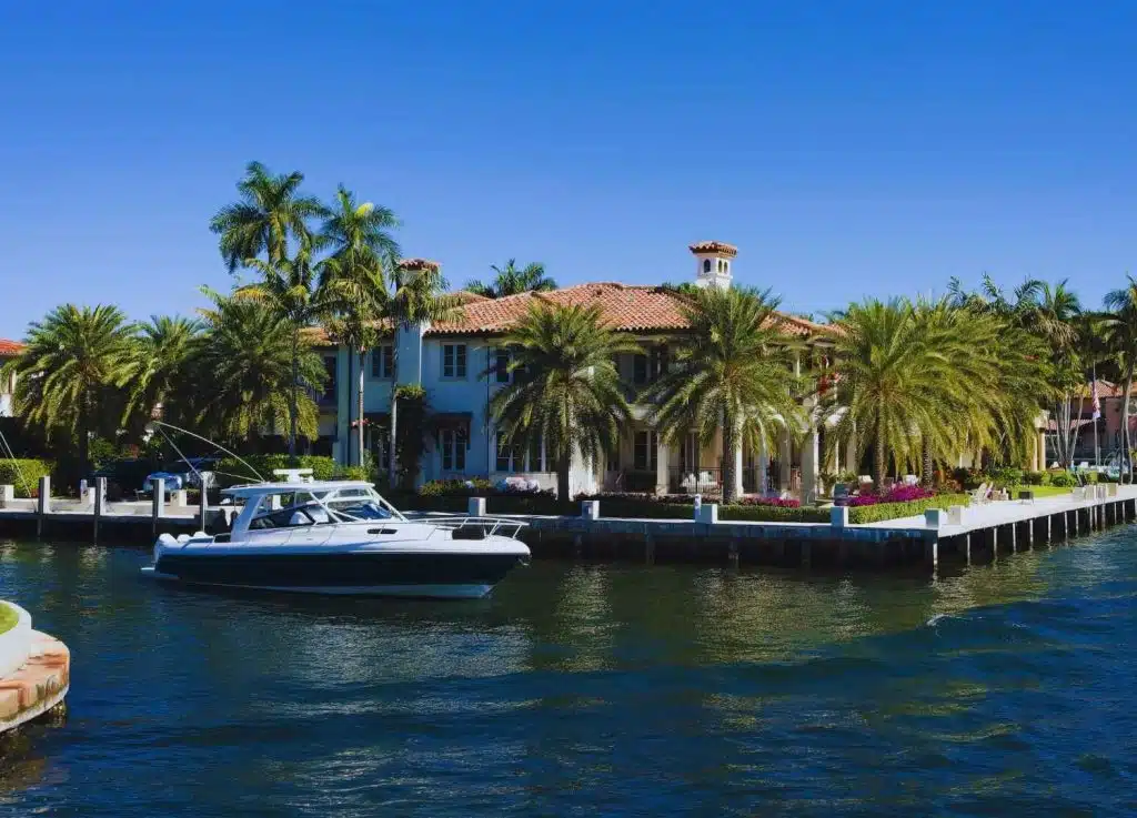 Luxury home with boat dock, symbolizing The Lenoir Team’s professional home selling expertise in Florida.