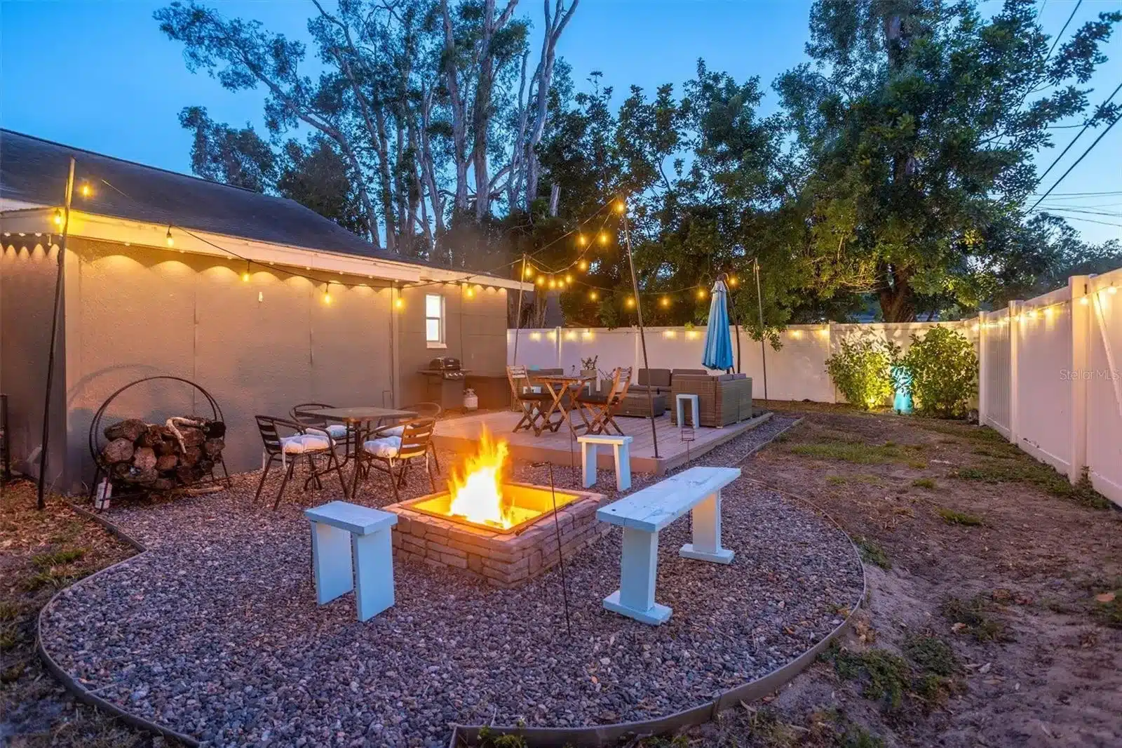 Outdoor firepit area at dusk