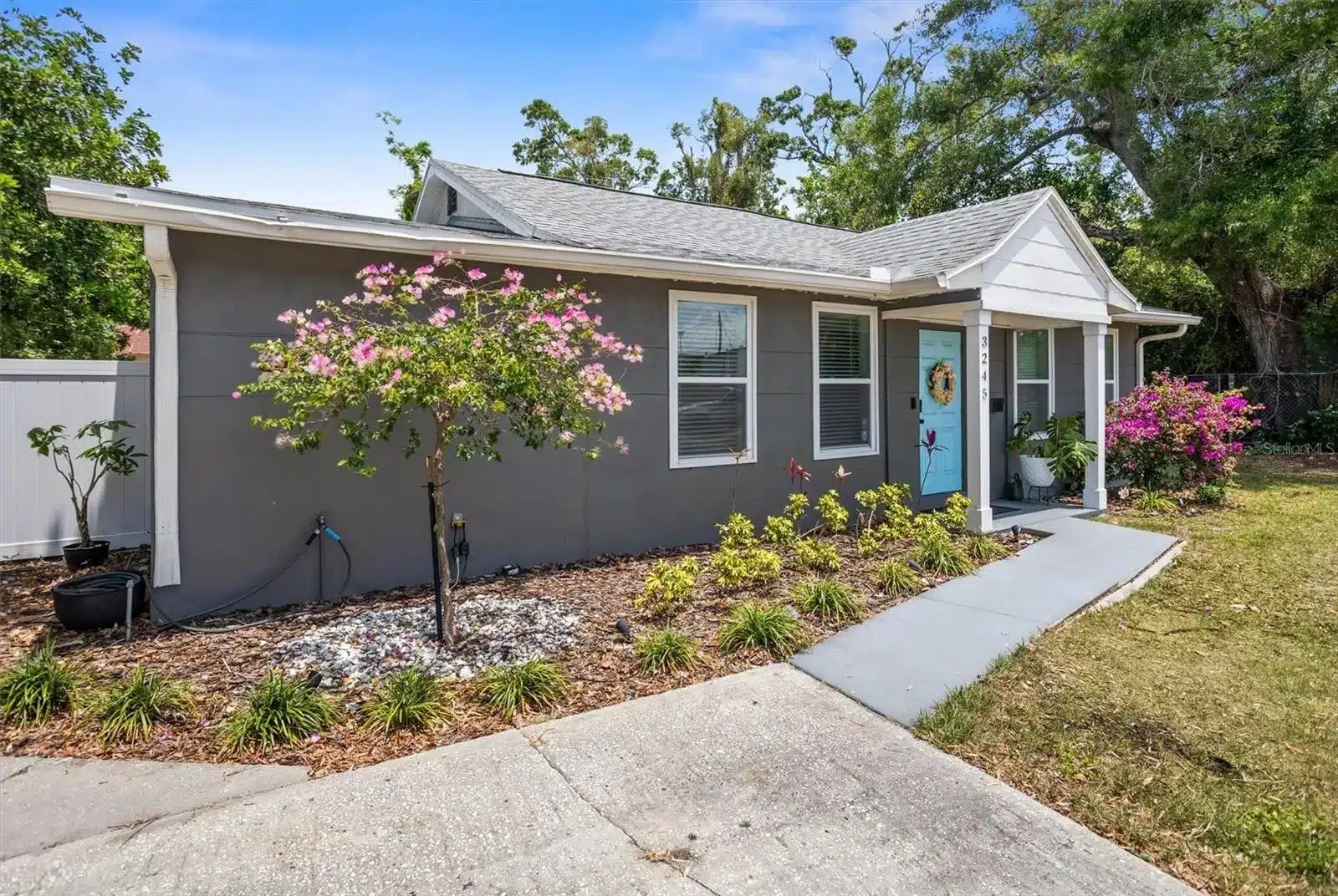 Front yard and side view of 3245 Freemont Terrace S