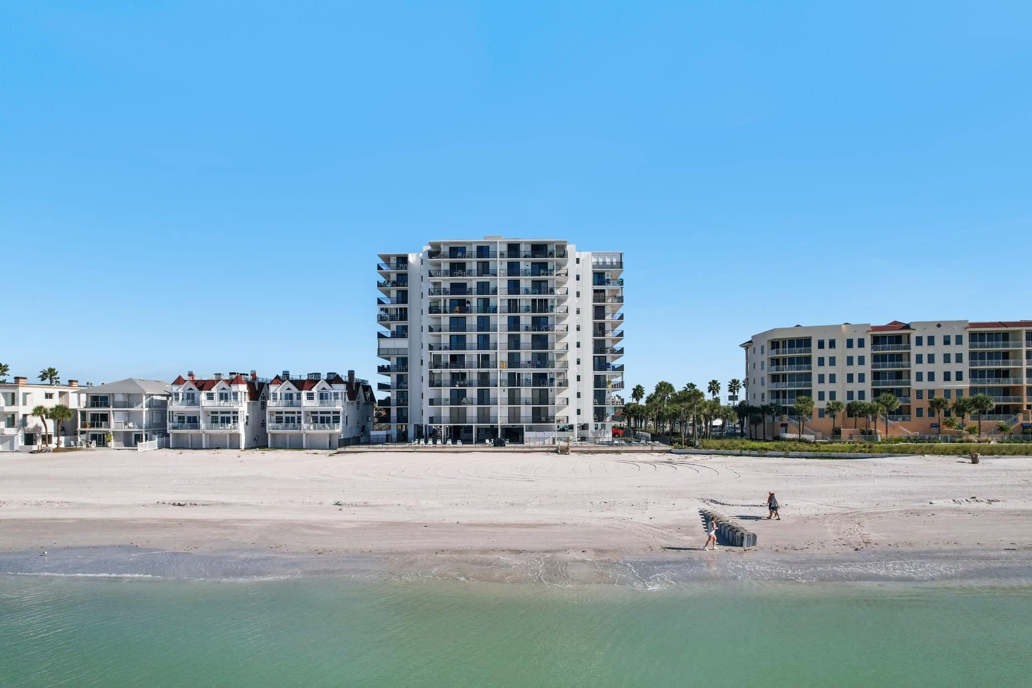Beachfront condo at 15316 Gulf Blvd Madeira Beach FL with sandy beach and Gulf of Mexico shoreline in front