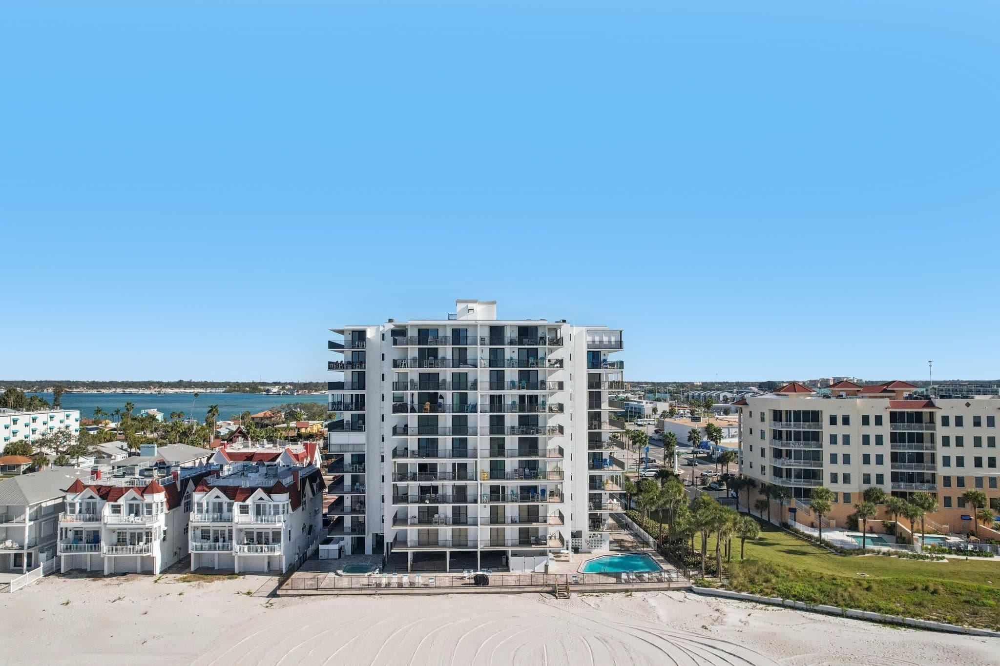 Gulf-front condo building at 15316 Gulf Blvd APT 801 Madeira Beach FL with beachfront access and balconies overlooking the ocean