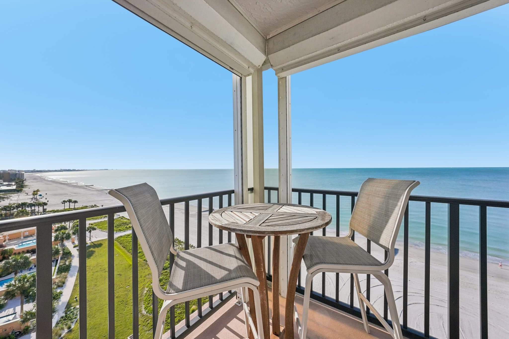 Private condo balcony with seating overlooking the Gulf of Mexico at 15316 Gulf Blvd Madeira Beach FL